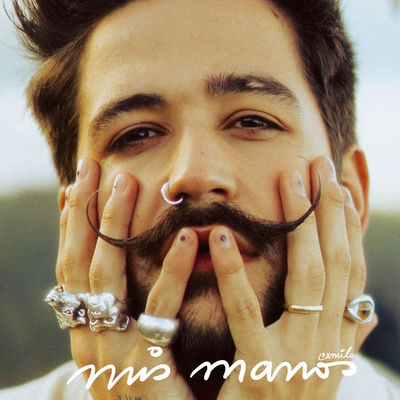 The cover of Mis Manos by Camilo