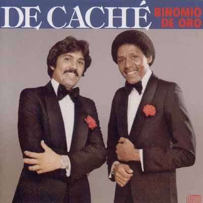 The cover of De Caché by Binomio de Oro
