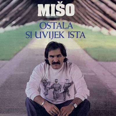 The cover of Ostala si uvijek ista by Mišo Kovač
